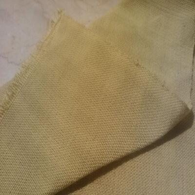 Tessuto in para-aramide antistaglio di livello 3 con trama diagonale 2/1 e valore di pH 5,7, adatto per applicazioni resistenti al taglio